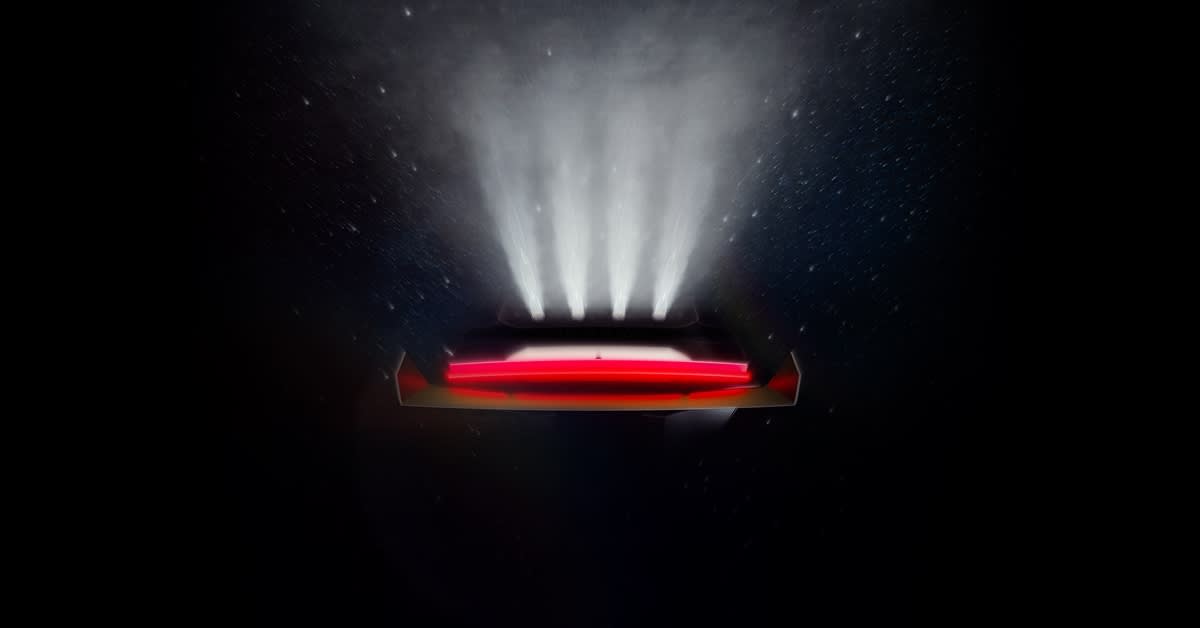 Tesla's official September 2026 Roadster teaser, with a dark vehicle, red lightbar and bright vertical lighting
